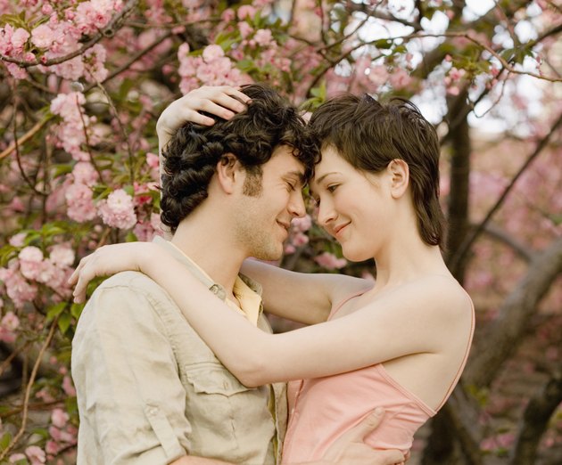 Couple embracing outdoors