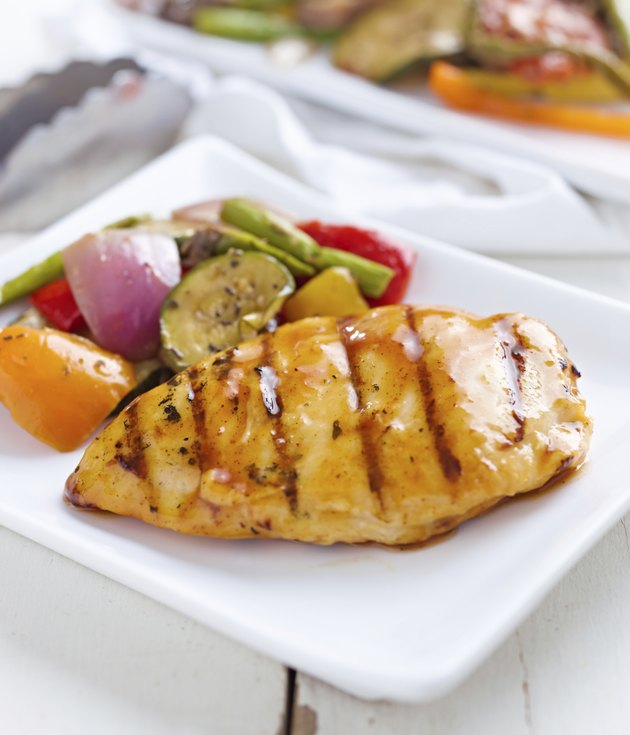summertime barbecue chicken with vegetables.