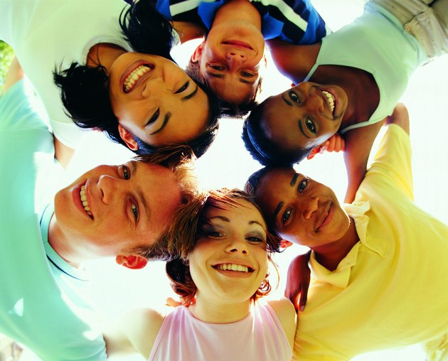 Group of teenagers in huddle