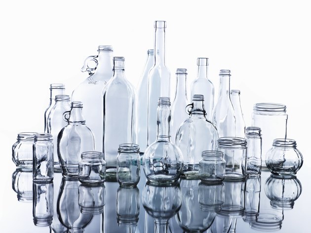 Collection of various glass bottles and jars
