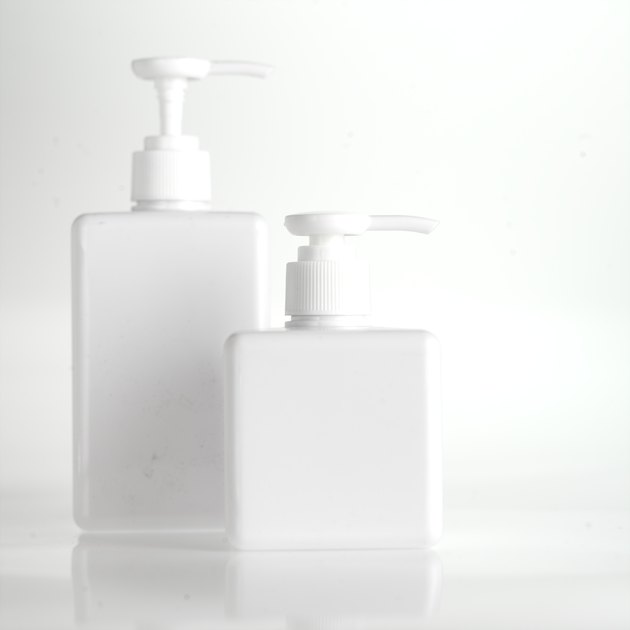 White liquid soap dispensers, close up