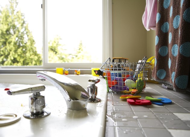 Basket with toys on kitchen worktop