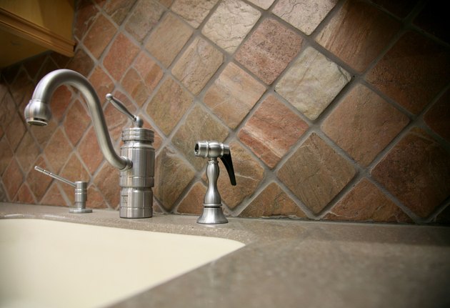 Faucet and sink in contemporary home kitchen