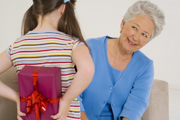 Girl with present for woman