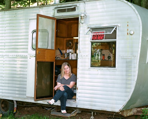 Woman with travel trailer