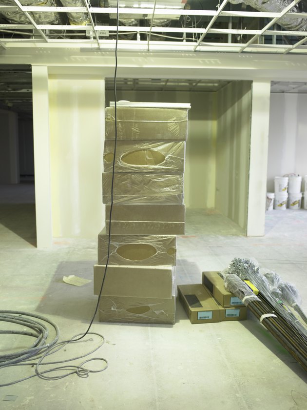 Boxes and supplies in empty office space