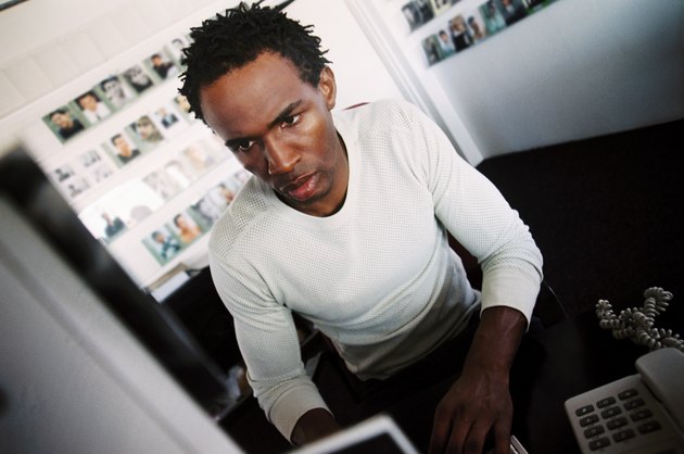 Close-up of a young man in an office