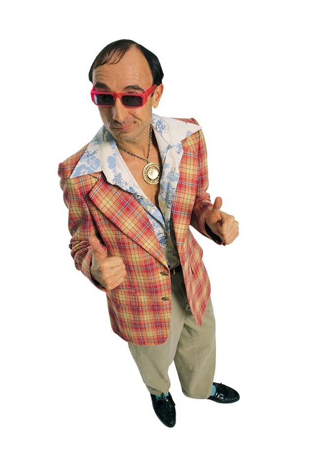 Cheesy guy in leisure suit giving thumbs up