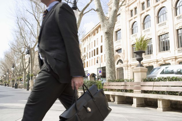 Businessman walking with briefcase