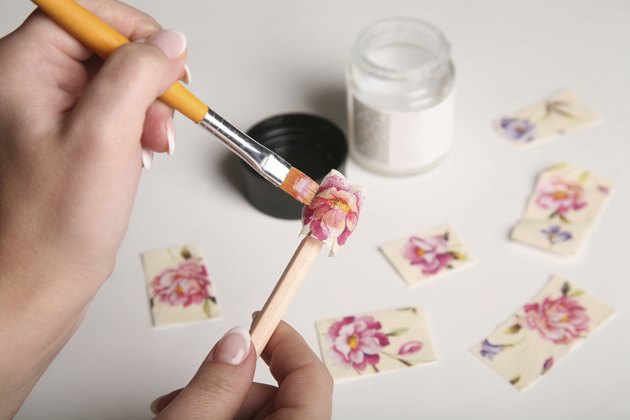 Decoupage of wooden bead with roses and peonies