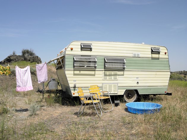 trailer with laundry, chairs wading pool