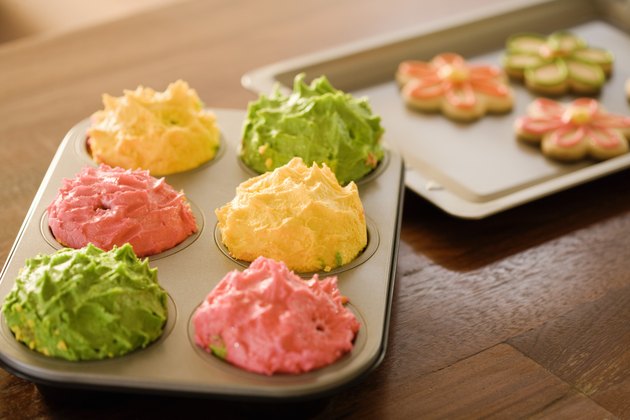 Frosted cupcakes in tin