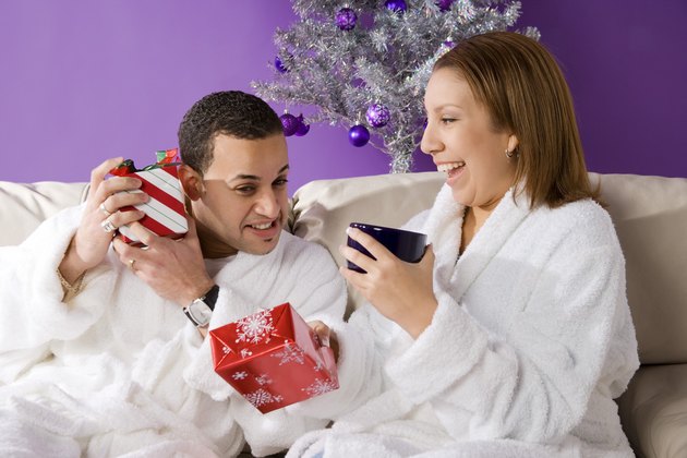 Couple with presents on Christmas morning