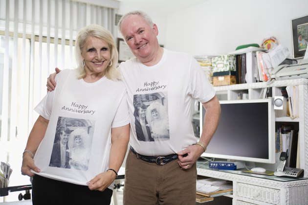 Senior couple wearing anniversary shirts