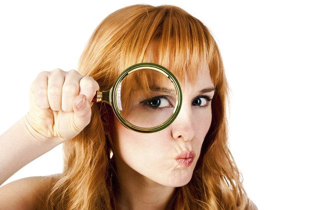 woman with magnifying glass