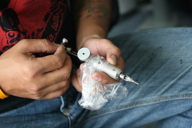 Tattoo artist.