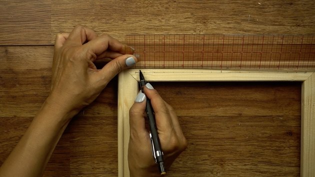 Measuring and marking canvas stretchers to make DIY simple frame loom.