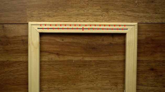 Measuring and marking canvas stretchers to make DIY simple frame loom.