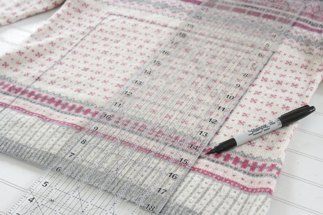 Pull out an old sweater from the bottom of your closet and create a cute and cozy sweater skirt for a little girl in your life.