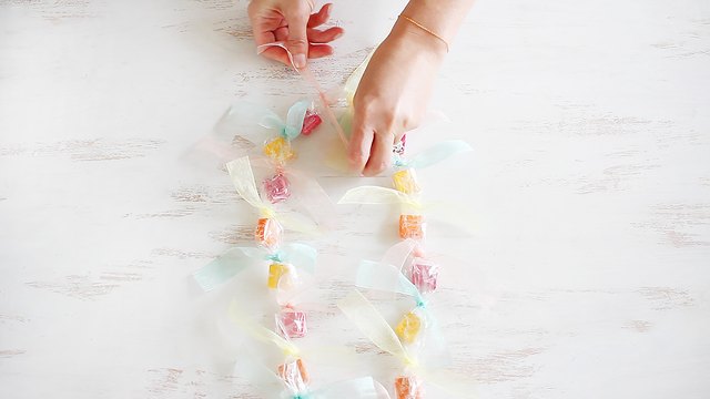 Tying ends of cellophane together