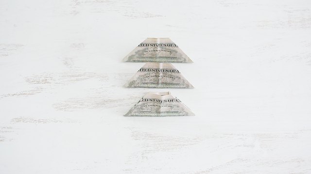 Three folded bills