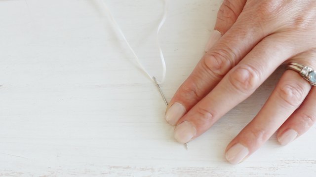 Threading needle with string
