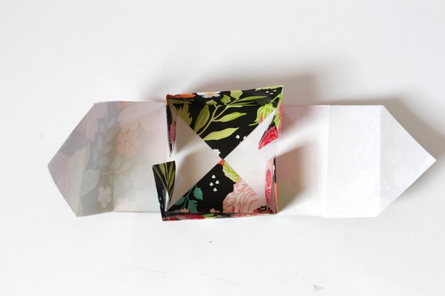 Make a big dramatic statement with a little paper box. They're perfect for those times when you need to add a little flair to a small gift for a friend or loved one. They even make great little wedding favor boxes.