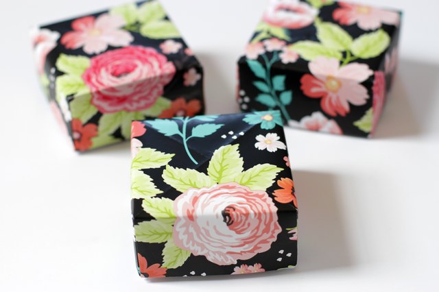Make a big dramatic statement with a little paper box. They're perfect for those times when you need to add a little flair to a small gift for a friend or loved one. They even make great little wedding favor boxes.