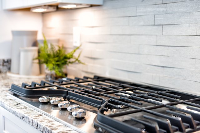 How to Get Burned Water Marks off a Stove