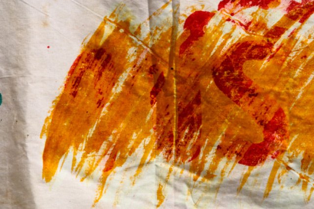 I used EVERY RED FABRIC PAINT I own to create ART ON A T-SHIRT 