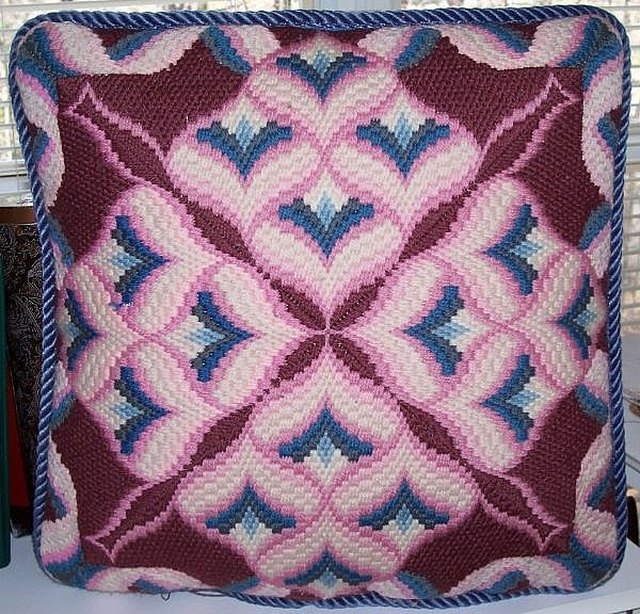 Stitching bargello embroidery on Aida cloth 