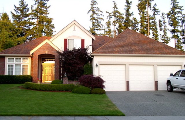 how-to-put-a-garage-door-back-on-track-ehow