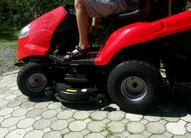 Changing tire on discount riding lawn mower