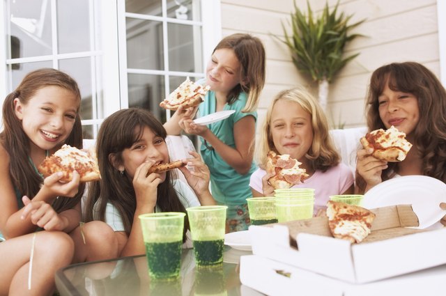 Girls having a pizza party
