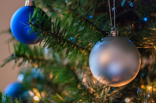 The Best Way to Put on Christmas Tree Lights | ehow