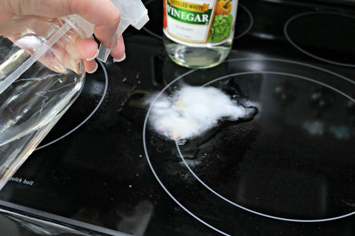 Clean melted plastic off a stovetop burner