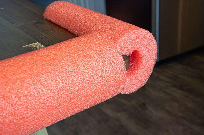 use a pool noodle on the edges of a table