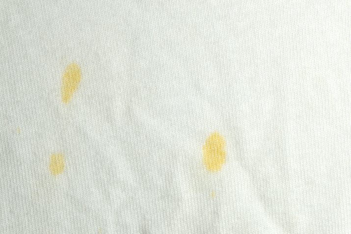 Mustard stain on white cloth
