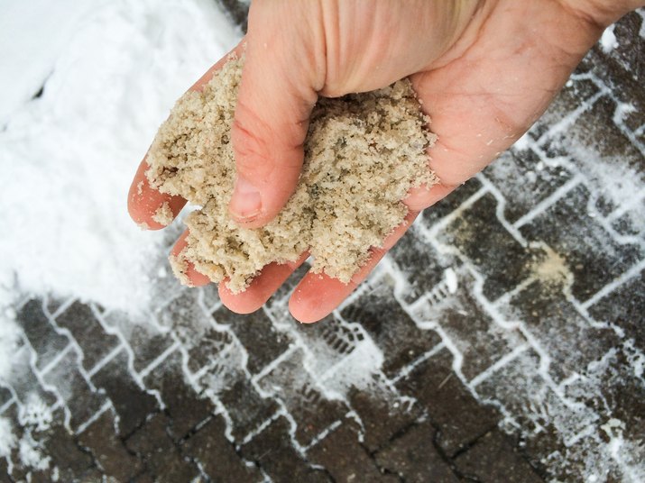 Hand with road salt