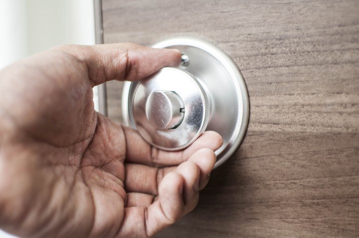 Holding a modern door knob