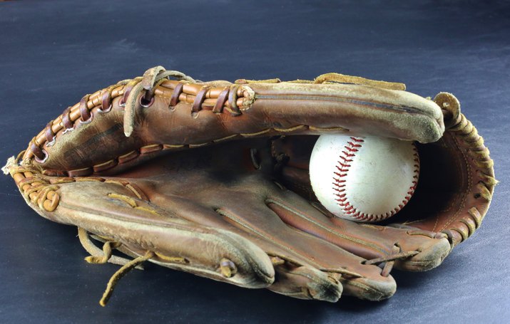 Baseball mitt with hard ball