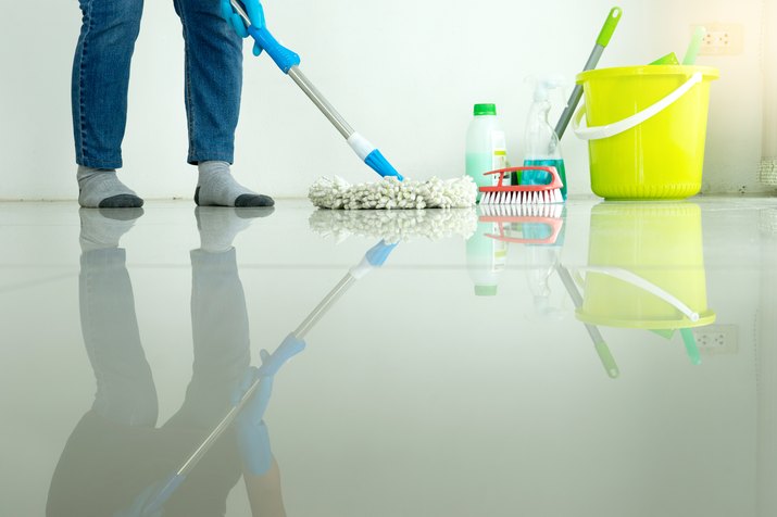woman work for clean house window sofa table