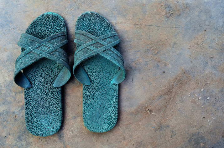 High Angle View Of Slippers On Floor