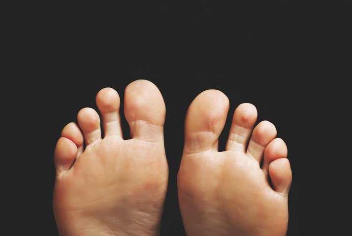 female clean heels on a black background