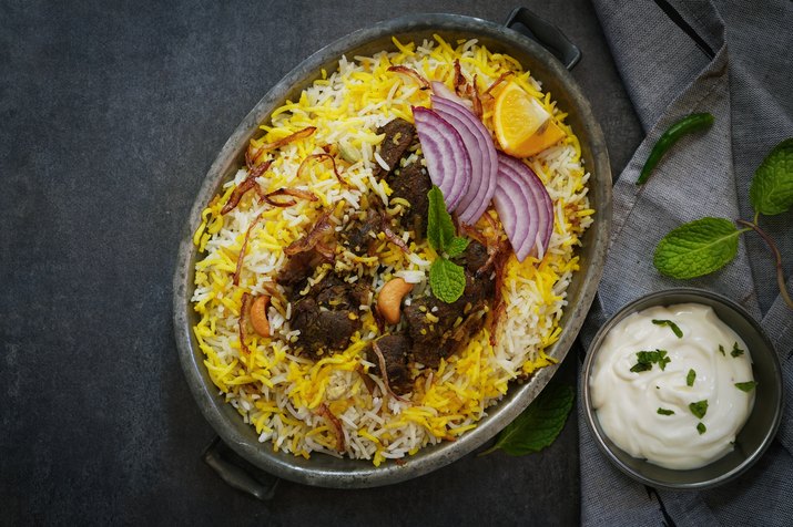 Homemade Beef Biryani Served With Raita Yogurt Dip, Overhead View