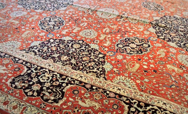 Refined design patterns of old Iranian rug in Tabriz