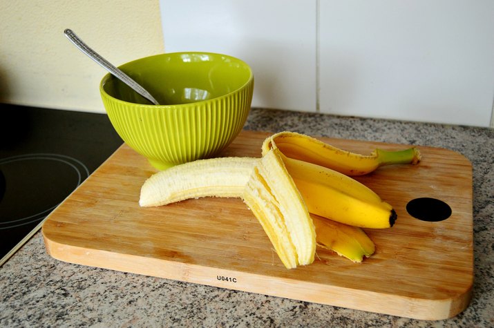 High Angle View Of Banana On Cutting Board