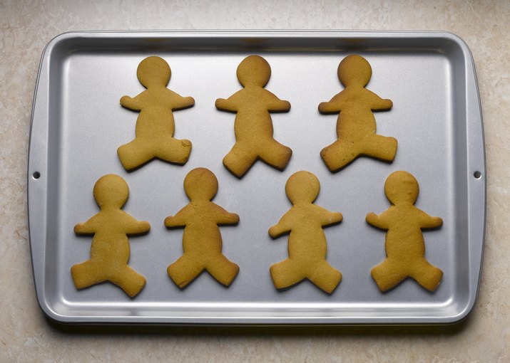 Gingerbread men on baking sheet