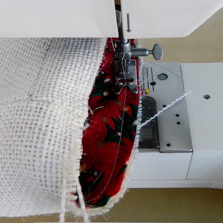 Woman using sewing machine