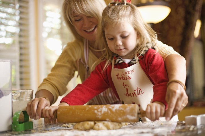 Mother and daughter baking cookies